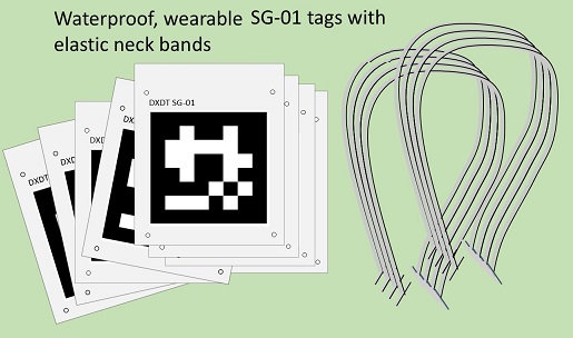 The lefthand side of the image depicts a set of 8, water resistant, two-sided SG-01 tags. The right side depicts 8 elastic bands that are provided with the SG-01 targets so the targets can be worn.